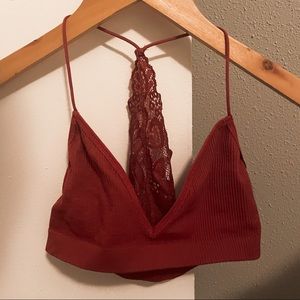 Super soft maroon lace bralette. There is a small hole next to the hem.